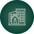 Icon of a house and high-rise building on a dark green background, symbolizing residential and urban structures.